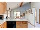 Bright eat-in kitchen featuring stainless steel appliances and a view to the dining area at 730 Ponderosa Ct, Fayetteville, GA 30214