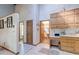 Spacious kitchen area showcases ample cabinets, tile flooring, and an open doorway to the dining room at 730 Ponderosa Ct, Fayetteville, GA 30214
