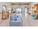 Spacious living room with vaulted ceilings, wood beams, and lots of natural light at 730 Ponderosa Ct, Fayetteville, GA 30214