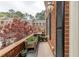 Charming balcony with brick accents, offering views of the surrounding neighborhood at 105 Jefferson Cir, Sandy Springs, GA 30328