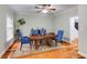 Inviting dining room with hardwood floors and stylish blue chairs around a wooden table at 105 Jefferson Cir, Sandy Springs, GA 30328