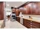 Gourmet kitchen featuring custom cabinets, granite countertops, and stainless steel appliances at 105 Jefferson Cir, Sandy Springs, GA 30328