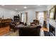 Inviting living room featuring hardwood floors, a fireplace, and comfortable seating at 105 Jefferson Cir, Sandy Springs, GA 30328
