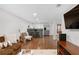 Open basement with a bar, stainless steel refrigerator, and entertainment area at 1254 Moores Mill Nw Rd, Atlanta, GA 30327