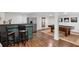Finished basement with bar area, stainless fridge, and a billiard table at 1254 Moores Mill Nw Rd, Atlanta, GA 30327