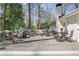 Outdoor deck featuring grill, seating, and a lush backyard setting at 1254 Moores Mill Nw Rd, Atlanta, GA 30327