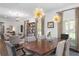 Spacious living and dining area with views of multiple rooms, hardwood floors and light fixtures at 1254 Moores Mill Nw Rd, Atlanta, GA 30327