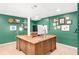 A home office featuring a wooden desk, a comfortable chair, and stylish decor at 1254 Moores Mill Nw Rd, Atlanta, GA 30327