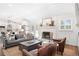 Spacious living room with fireplace and open access to the stylish kitchen at 1254 Moores Mill Nw Rd, Atlanta, GA 30327