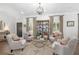 Bright and airy living room featuring hardwood floors, recessed lights, and stylish furnishings at 1254 Moores Mill Nw Rd, Atlanta, GA 30327