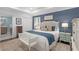 Spacious main bedroom with tray ceiling and ample natural light at 1254 Moores Mill Nw Rd, Atlanta, GA 30327
