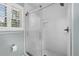 Modern shower with glass doors and subway tile at 1254 Moores Mill Nw Rd, Atlanta, GA 30327