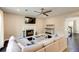 The living room has a fireplace, tv, and sectional sofa at 1855 Keswick Place Dr, Lawrenceville, GA 30043