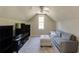 Cozy living room with vaulted ceiling and comfortable seating at 1855 Keswick Place Dr, Lawrenceville, GA 30043