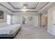 Large main bedroom with ensuite bathroom featuring a walk-in glass enclosed shower at 1855 Keswick Place Dr, Lawrenceville, GA 30043