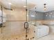 Spa-like bathroom with tile floors, glass shower, and a relaxing soaking tub at 35 Tracechain, Stockbridge, GA 30281