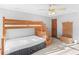 Bedroom with carpet, ceiling fan, bunkbed, natural light, and wood trim at 35 Tracechain, Stockbridge, GA 30281