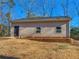 Detached garage with landscaping and lawn at 35 Tracechain, Stockbridge, GA 30281