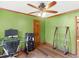 Office space featuring a ceiling fan, hardwood floors, and storage options at 35 Tracechain, Stockbridge, GA 30281