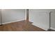 Living room with hardwood floors and grey walls at 5074 Park Ave, Forest Park, GA 30297