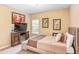 Cozy bedroom with a large bed, TV, and ample natural light at 7847 Wrotham Cir, Atlanta, GA 30349