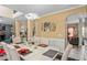 Elegant dining room with contemporary lighting, seating, and open floor plan at 7847 Wrotham Cir, Atlanta, GA 30349