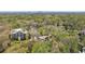 Aerial view showing property location with mature trees, in an established neighborhood at 1209 The By Ne Way, Atlanta, GA 30306