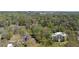Aerial view showing property location with mature trees in an established neighborhood at 1209 The By Ne Way, Atlanta, GA 30306