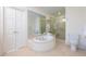 Bathroom with a soaking tub, glass shower, and dual access at 1209 The By Ne Way, Atlanta, GA 30306