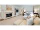 Elegant bedroom with a fireplace, sitting area, and adjoining library at 1209 The By Ne Way, Atlanta, GA 30306