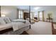 Spacious main bedroom with sitting area, plush carpet, and natural light at 1209 The By Ne Way, Atlanta, GA 30306