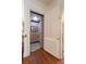 Home elevator with wood floors and neutral colored walls, providing easy access between floors at 1209 The By Ne Way, Atlanta, GA 30306