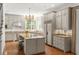 Spacious kitchen featuring granite countertops, stainless steel appliances, and a stylish island at 1209 The By Ne Way, Atlanta, GA 30306