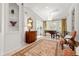 Elegant sitting room with a piano and French doors, offering a serene space at 1209 The By Ne Way, Atlanta, GA 30306