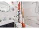 Bathroom with modern fixtures, decorative art, and a bathtub and shower combination at 2560 Ashley Downs Ln, South Fulton, GA 30349