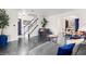 Stylish living room showing staircase, front door and dining area at 2560 Ashley Downs Ln, South Fulton, GA 30349