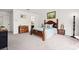 Large main bedroom with natural light, carpet and neutral decor at 2560 Ashley Downs Ln, South Fulton, GA 30349