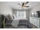 Bedroom with large window and plush patterned bedding at 1064 Brooks Rackley Rd, Dallas, GA 30157