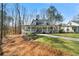 Inviting home featuring a spacious covered porch, manicured lawn, and charming curb appeal at 1064 Brooks Rackley Rd, Dallas, GA 30157