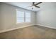 Cozy carpeted bedroom with ample natural light at 5328 Monticello Dr, Villa Rica, GA 30180