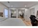 View from a bedroom looking at mirrored closet doors reflecting the other bedroom in the home at 3201 Lenox Rd Ne # 13, Atlanta, GA 30324