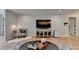 Stylish living room showcasing a media center, hardwood floors and contemporary design elements at 3201 Lenox Rd Ne # 13, Atlanta, GA 30324