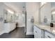 Bathroom featuring dual vanities, granite countertops, tile floors, and a standalone shower at 525 Springer Nw Bnd, Marietta, GA 30060