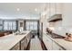 Open kitchen featuring marble countertops, stainless appliances, and abundant natural light at 525 Springer Nw Bnd, Marietta, GA 30060
