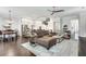 Open concept living area with modern lighting, hardwood floors, and stylish furniture at 525 Springer Nw Bnd, Marietta, GA 30060