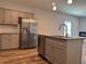 Well-equipped kitchen with stainless steel appliances, granite countertops, and a functional island at 6420 Olmadison Pl, Atlanta, GA 30349