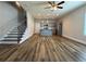 Bright and open living area flows into a modern kitchen with stainless steel appliances and an island at 6420 Olmadison Pl, Atlanta, GA 30349
