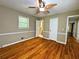 Bedroom with hardwood floors, ceiling fan and natural light at 663 Embry Ln, Marietta, GA 30066