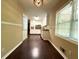 View of the dining area leading to the kitchen, filled with natural light at 663 Embry Ln, Marietta, GA 30066
