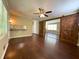 Open living room with dark wood floors and rustic barn door feature at 663 Embry Ln, Marietta, GA 30066